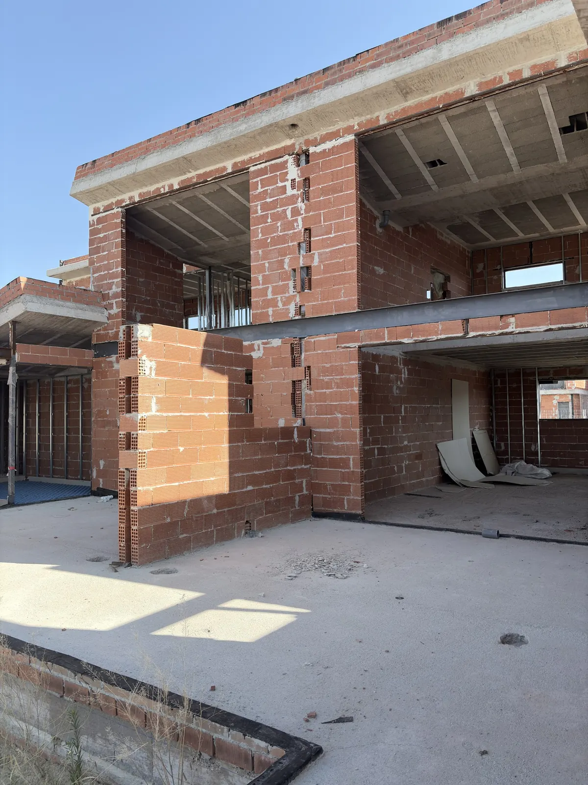 Obra nueva de cuatro adosados en Villaviciosa de Odón (Madrid)